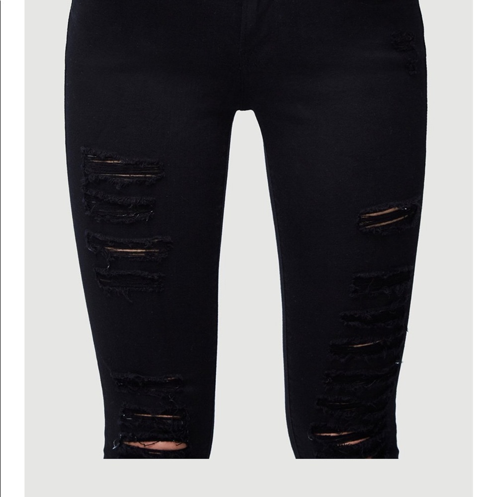 Frame skinny black mid-rise ripped jeans